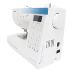 Janome Sewist 780DC computerized sewing machine rear-side angle showing stitch chart, control panel, and power ports.