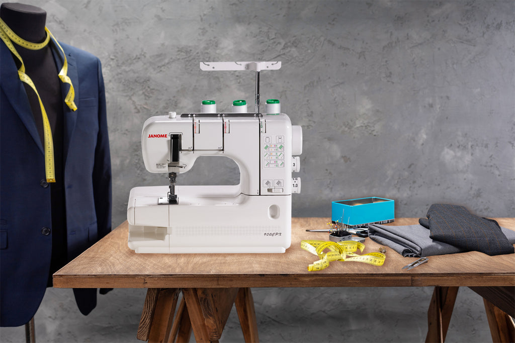 Janome CoverPro 900CPX shown in a sewing workspace