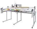 Janome Quilt Maker 18 manufacturer machine and frame view; fabric shown for demonstration
