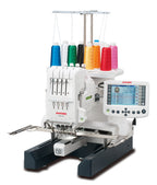 Janome MB-4S four-needle embroidery machine with thread cones and remote screen