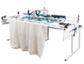 Janome Quilt Maker 15 manufacturer machine and frame view; fabric shown for demonstration