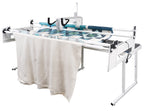 Janome Quilt Maker 15 manufacturer machine and frame view; fabric shown for demonstration