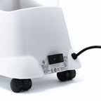 Rear view of the Jiffy 1201 J-2000H Hat Steamer showing power switch, caster wheels, and durable build for home or professional hat care.