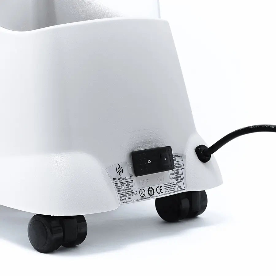 Detail shot of the Jiffy J-2000S steamer power switch and caster wheel