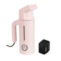 Jiffy ESTEAM Pink Travel Steamer shown with included universal voltage converter, portable garment steaming set for international travel.