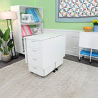 Kangaroo Kookaburra Cutting Table in Ash White K3451 folded in a sewing room