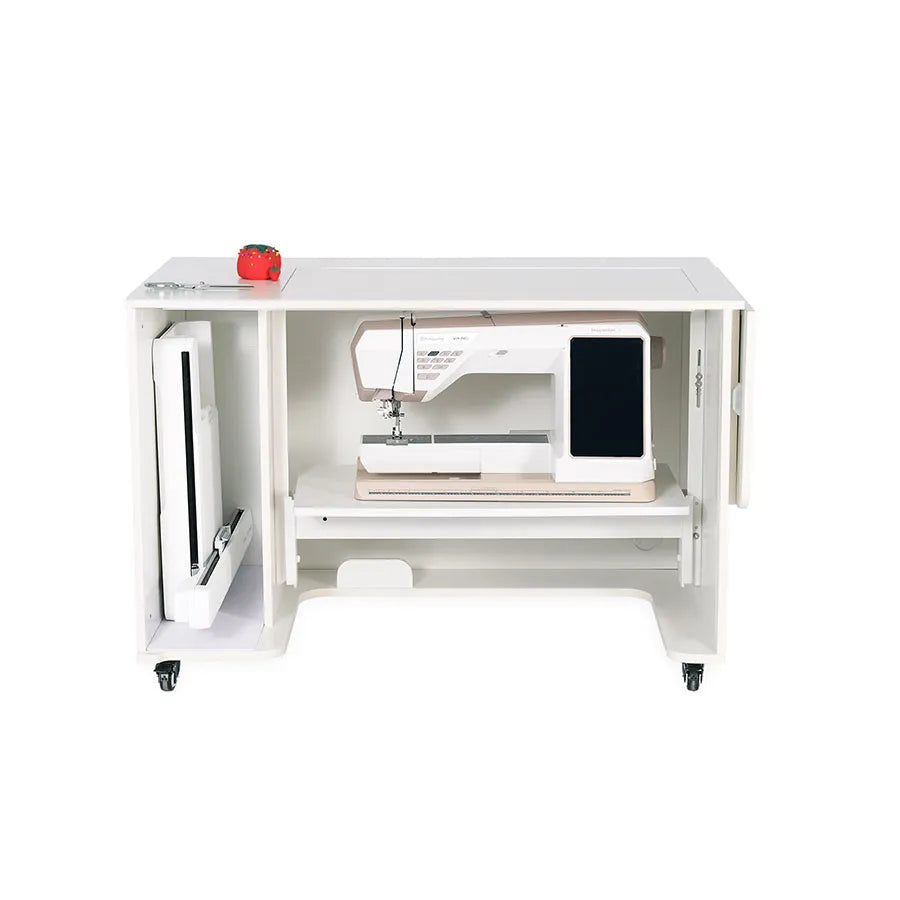Kangaroo Melbourne Sewing Cabinet in Ash White with sewing machine lowering into the cabinet and storage door open