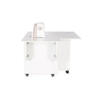 Rear side view of Kangaroo Melbourne Sewing Cabinet in Ash White with machine positioned on lift platform
