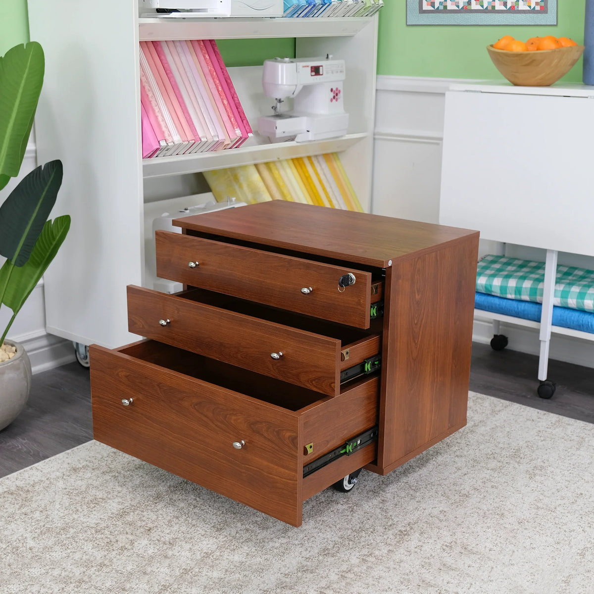 Kangaroo Joey Storage Cabinet in Teak K7805 with drawers open in a sewing studio