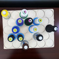 King Spool Thread Storage Tray for 5,000m Spools — overhead view with sample king-size spools