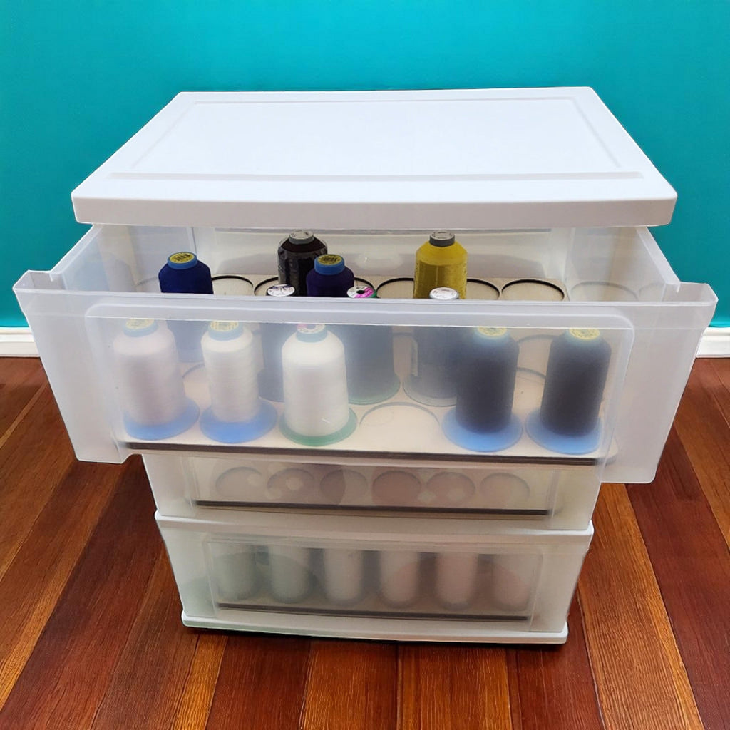 Cart with the upper drawer extended, furniture shown for context, for King Spool Thread Storage Tray for 5,000m Spools