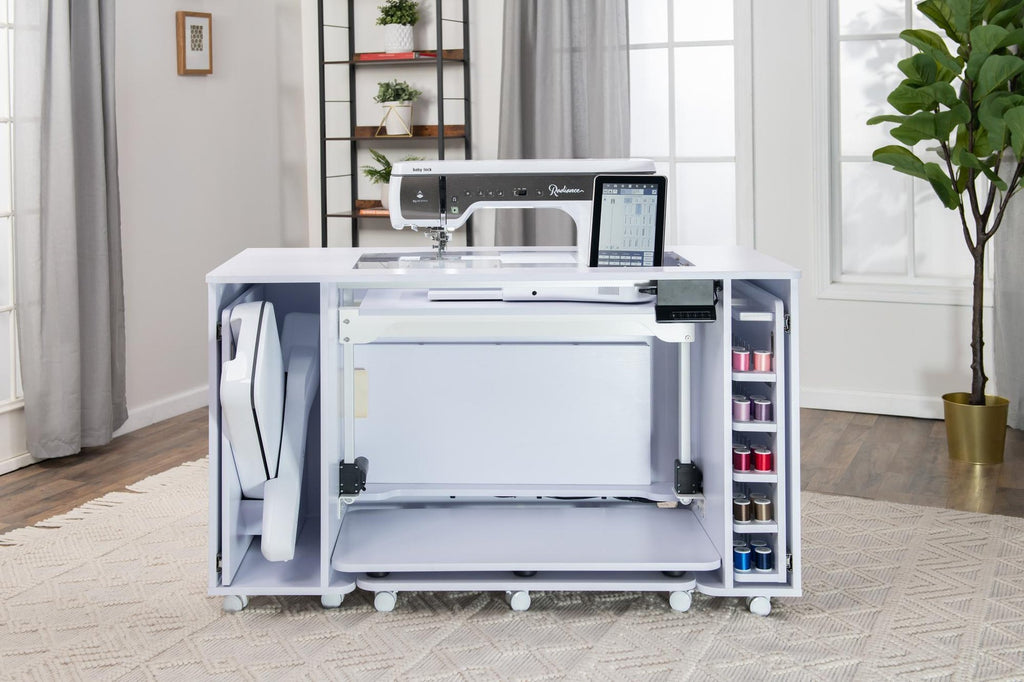 Koala All-In-One Embroidery Studio in White Ash with storage open; machine and supplies shown for illustration