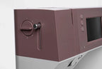Close-up of a kitchen appliance with control knobs and display on a white background