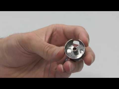 Reinstalling the Q’nique bobbin-case spring