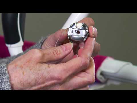 Installing an M-class bobbin in a Q’nique quilting machine