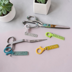 Fabric, Embroidery, Craft, and Mine scissor fobs shown with scissors for illustration