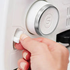 Close-up of stitch length adjustment dial on SINGER SE017 Elite serger for customizable overlock and rolled hem stitches