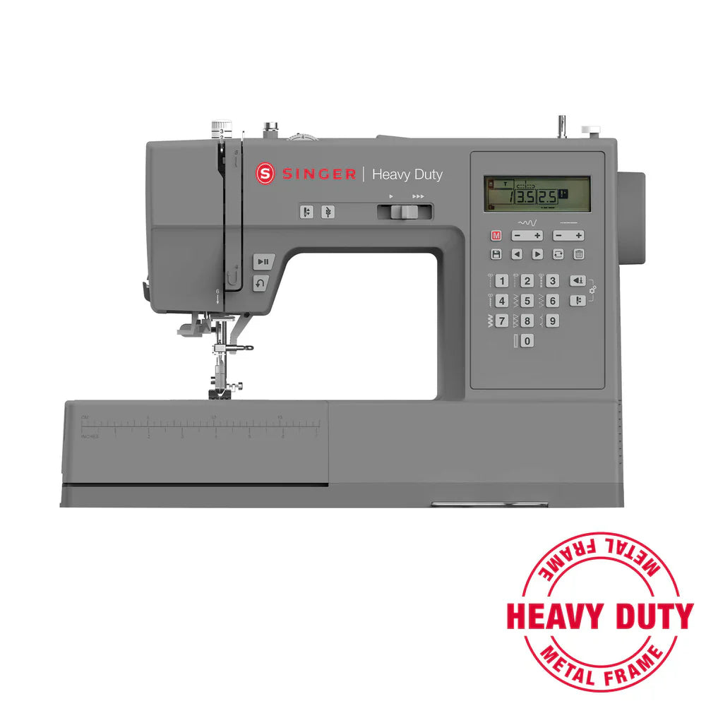 SINGER Heavy Duty 6700C sewing machine with metal frame construction and computerized stitch selection display