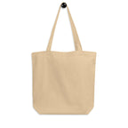 Plain natural-color back of the Merry & Bright Floral Cheer tote, showing the long handles and bottom gusset.