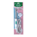 Clover Mini Iron in its retail package, with a narrow pressing tip, white-and-green handle and coiled power cord.