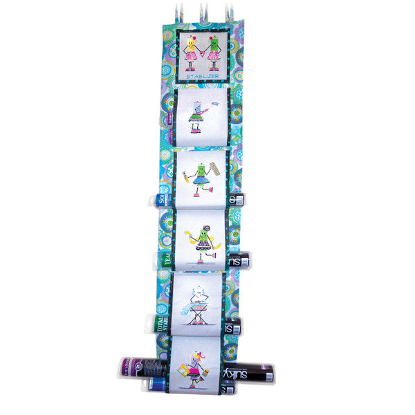 Finished hanging stabilizer organizer with embroidered Spoolie characters, patterned borders and rolls held along the sides.
