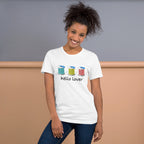 Model wearing the White Hello Lover T-shirt with three colorful thread spools above black script lettering.