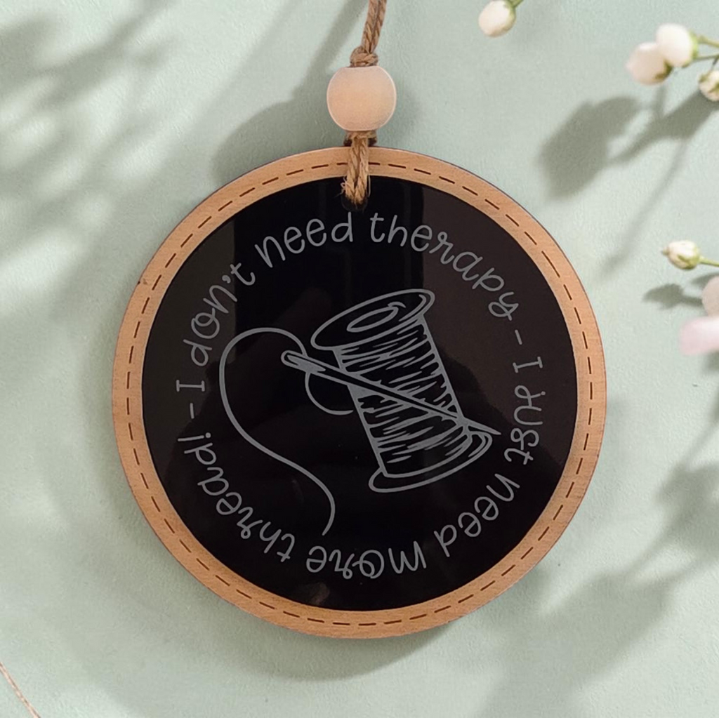 Round thread-themed ornament included in the Embroidery Lover's Gift Box