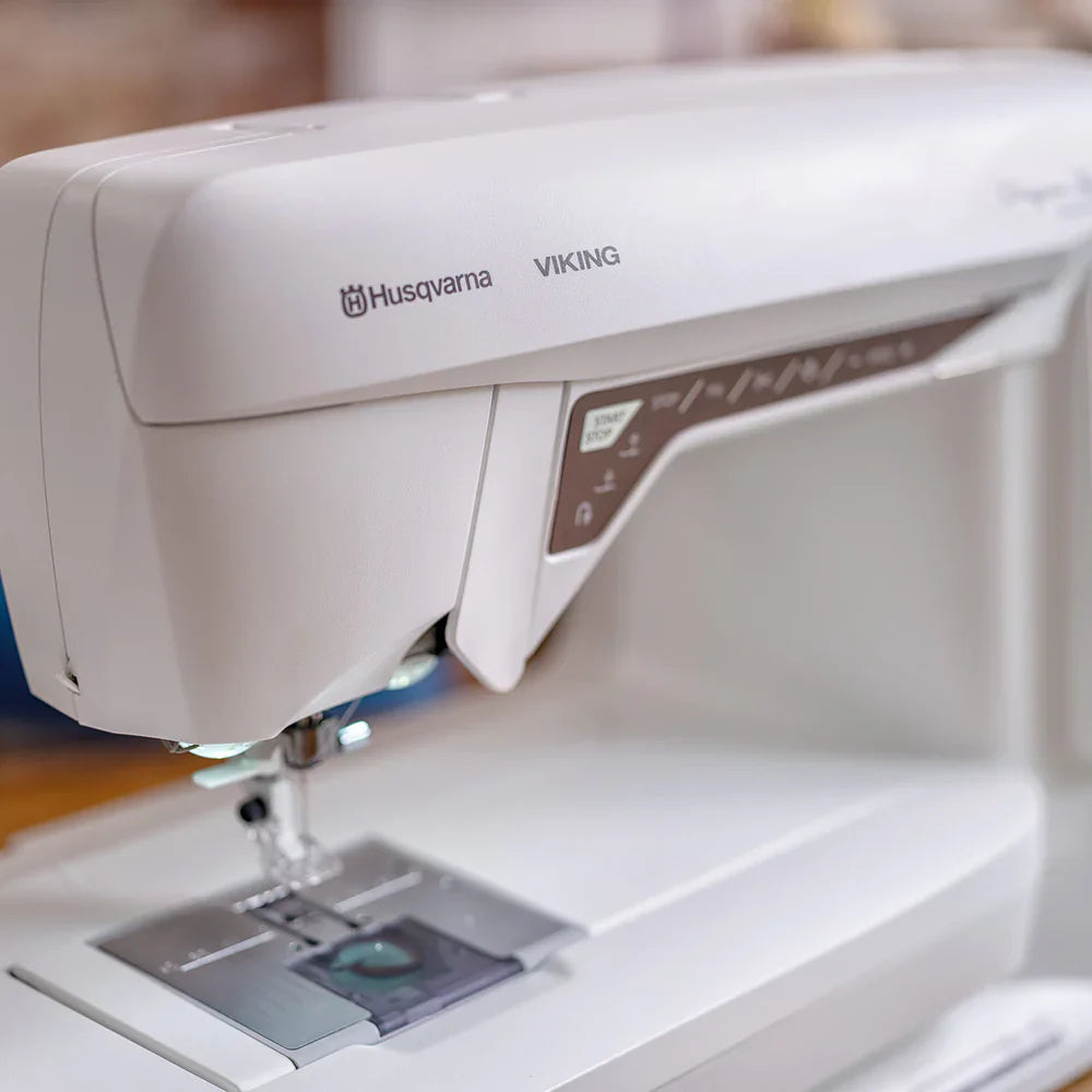 Husqvarna Viking Designer Topaz 40 sewing machine needle area with LED lighting and presser foot detail