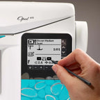 Hand adjusting stitch settings on the Husqvarna Viking Opal 670 sewing machine touch screen control panel