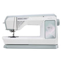 Husqvarna Viking Topaz 55Q computerized sewing machine side view featuring large workspace and color touchscreen