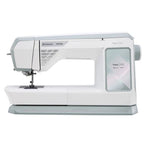 Husqvarna Viking Topaz 55Q computerized sewing machine side view featuring large workspace and color touchscreen