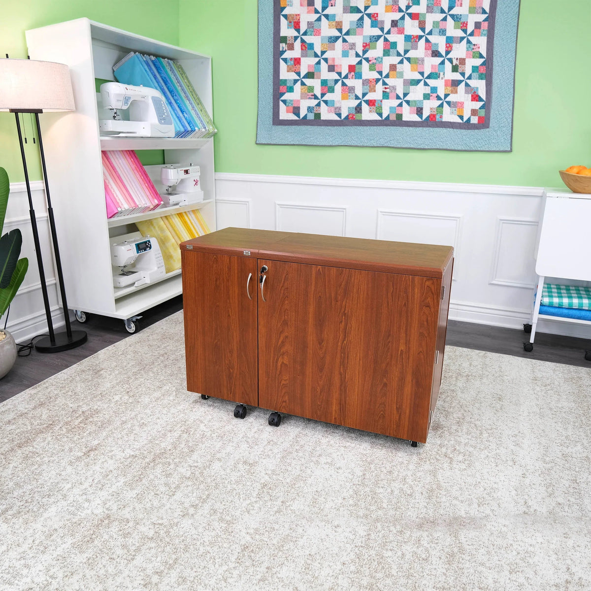 Teak Kangaroo Wallaby hydraulic sewing cabinet folded closed on locking casters